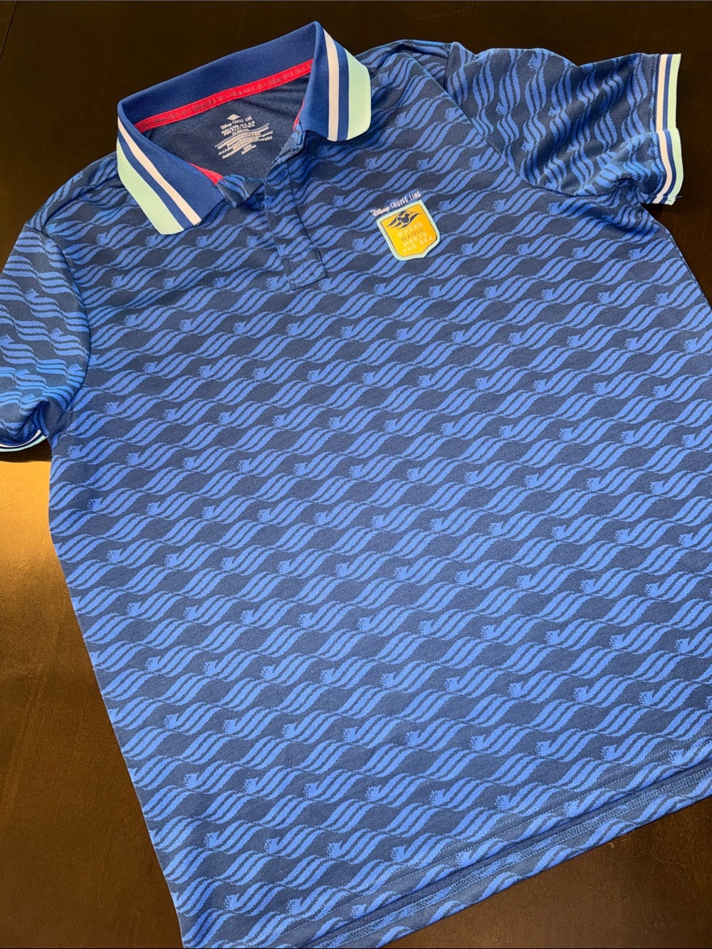 Disney Cruise Line Men's Blue Patterned Polo Shirt with Contrast Collar